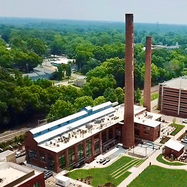 News / Tuttle Cuts Ribbon on Power House at University Center